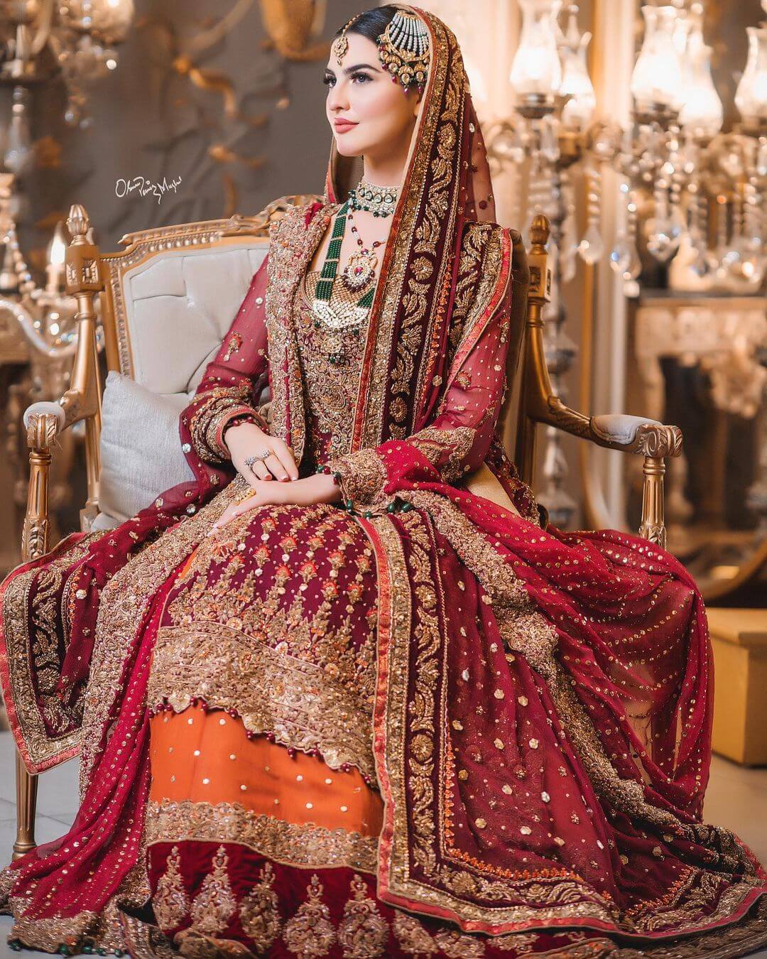 A Mesmerizing Bridal Outfit: Combining Maroon, Wine-Red, and Tangerine with Zardozi, Zari, Tilla, and Mirror Work