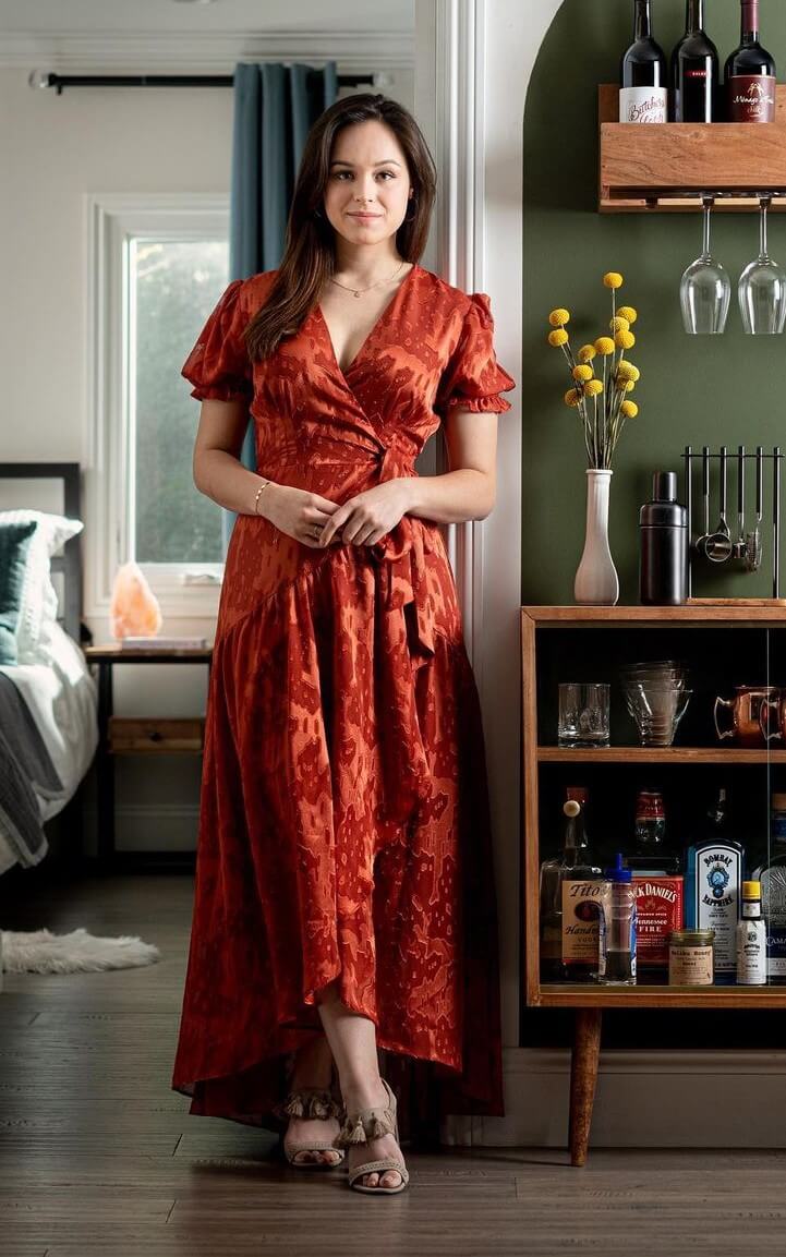 A Sophisticated Look: Hayley Orrantia's Brick Brown Printed Overlap Dress