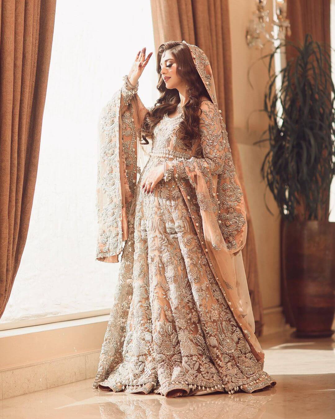 A Stunning Peach Anarkali Outfit for the Big Day: Lara Ibrahim's Beautiful Wedding Look