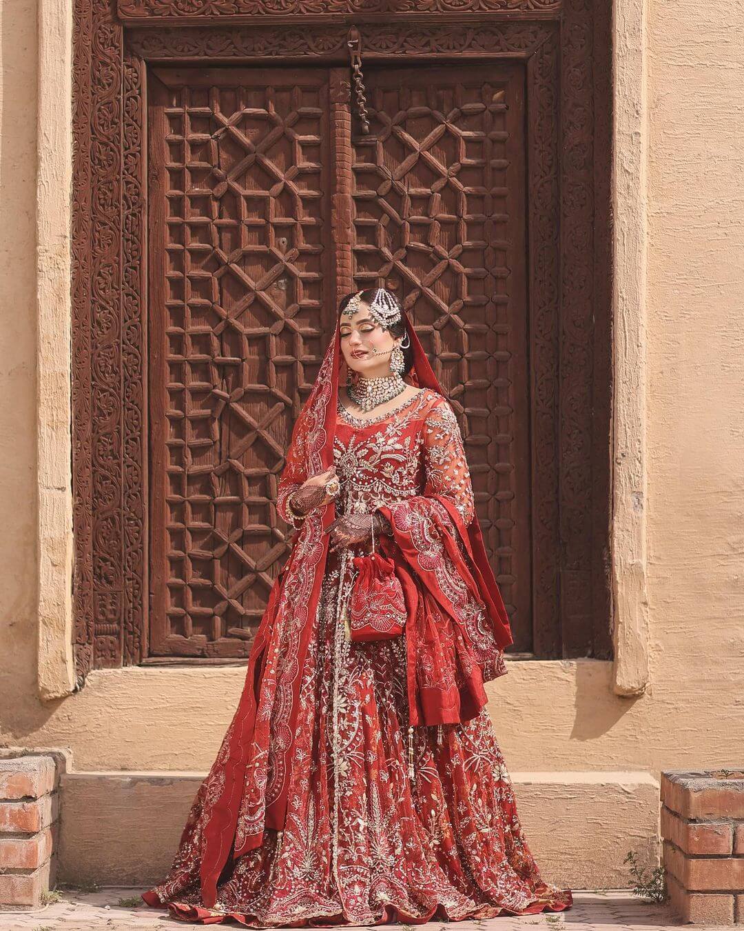 A Stunning, Smart Look: Red Pishwas with Silver Embroidery and a Gold-Embellished Lehenga