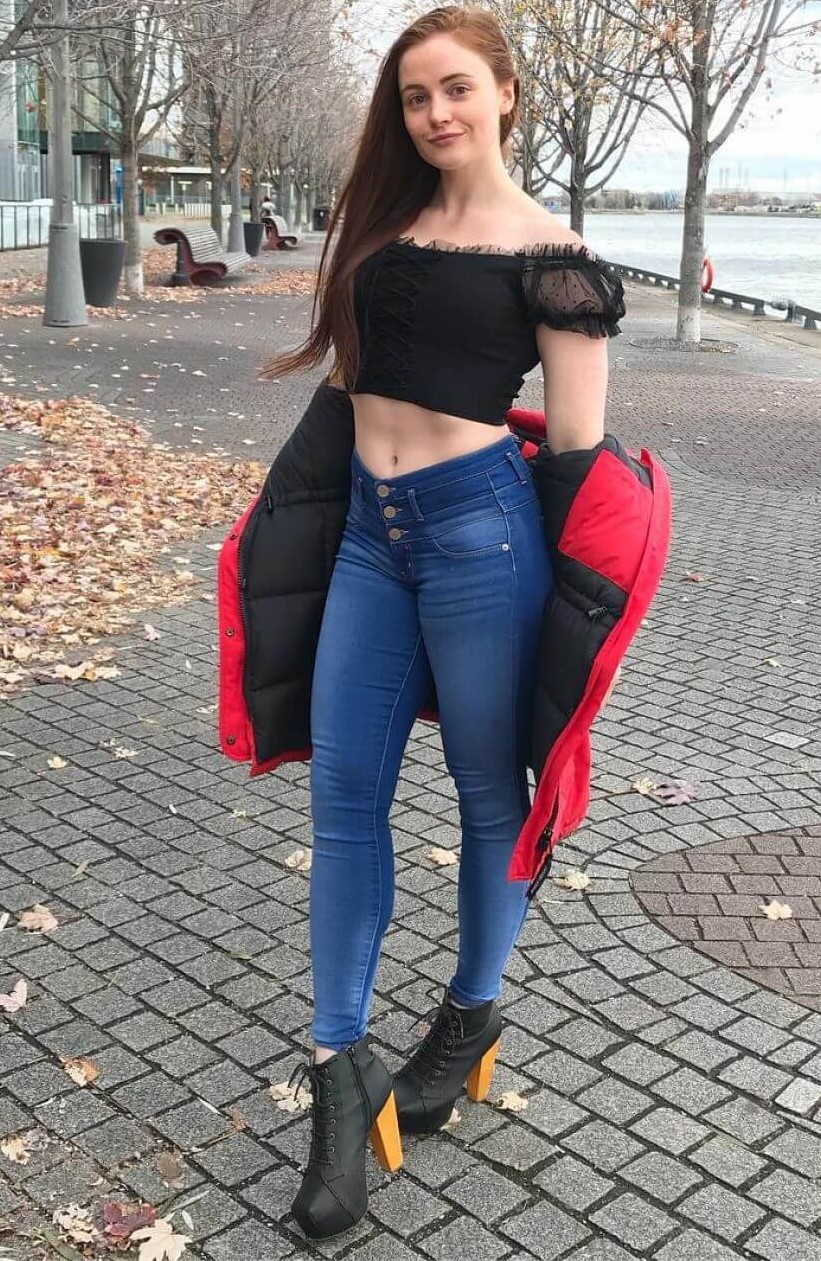Abby Pollock Awesome Look In Blue Jeans & Black Off Shoulder Sexy Crop Top With Red & Black Coat