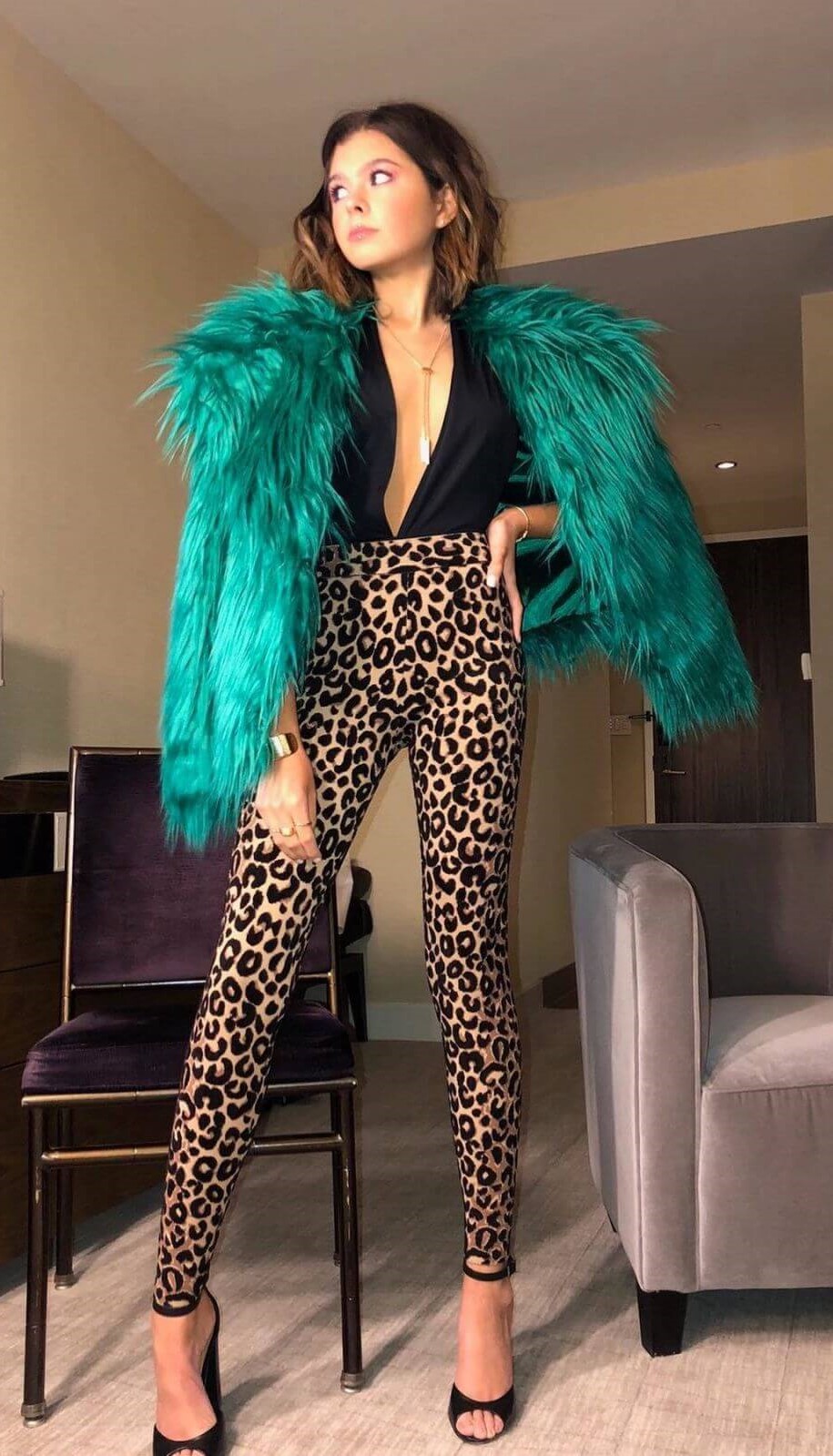 Addison Riecke In Deep Neck Animal Print Jumpsuit With Bright Green Fur Coat