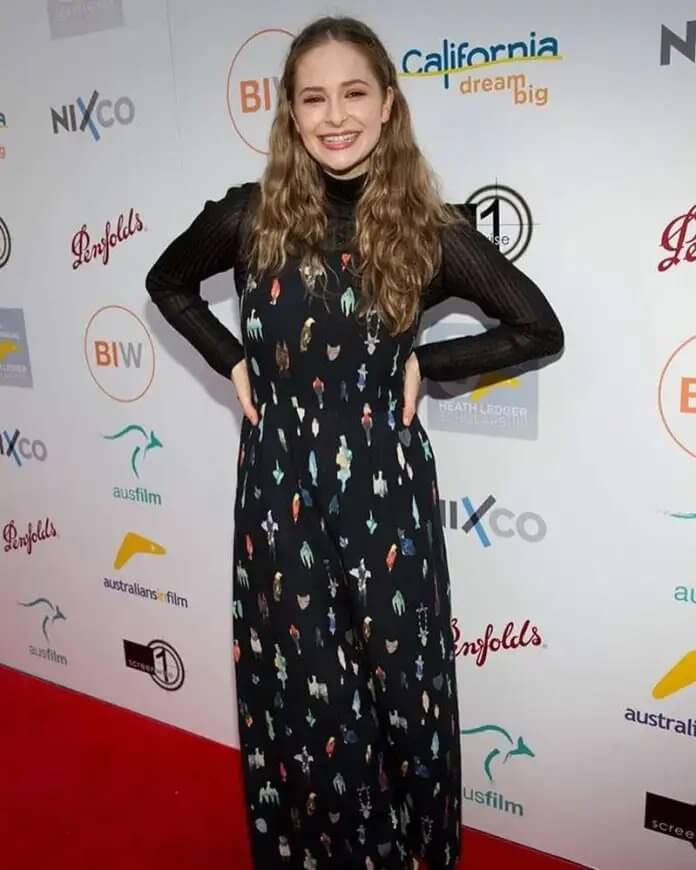 Ashleigh Cummings In Printed Black Dress