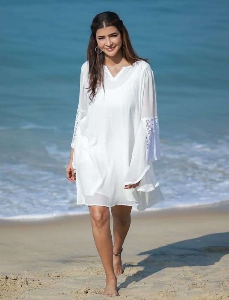 Beach Bae Manchu Lakshmi Vacay Look In White Dress With Flared Full Sleeves