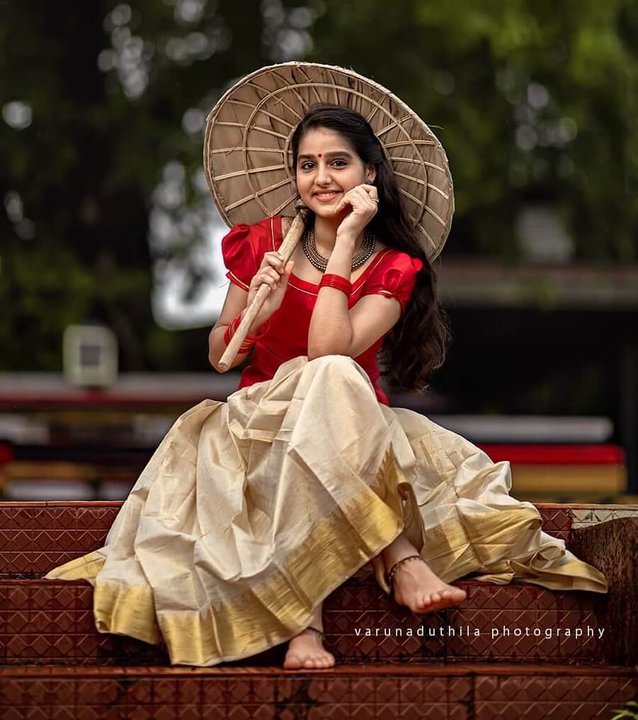 Beautiful Anaswara Rajan In Maroon Blouse Paired With Off White Skirt  Festive Look
