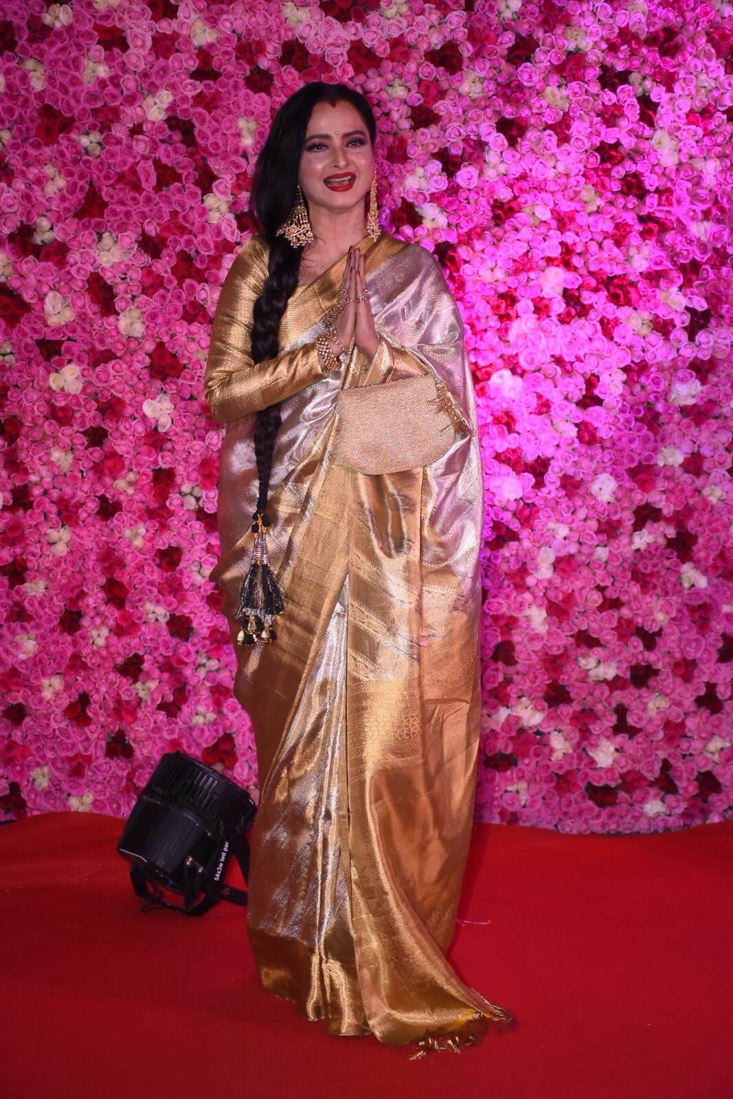 Blush pink saree with golden border and print