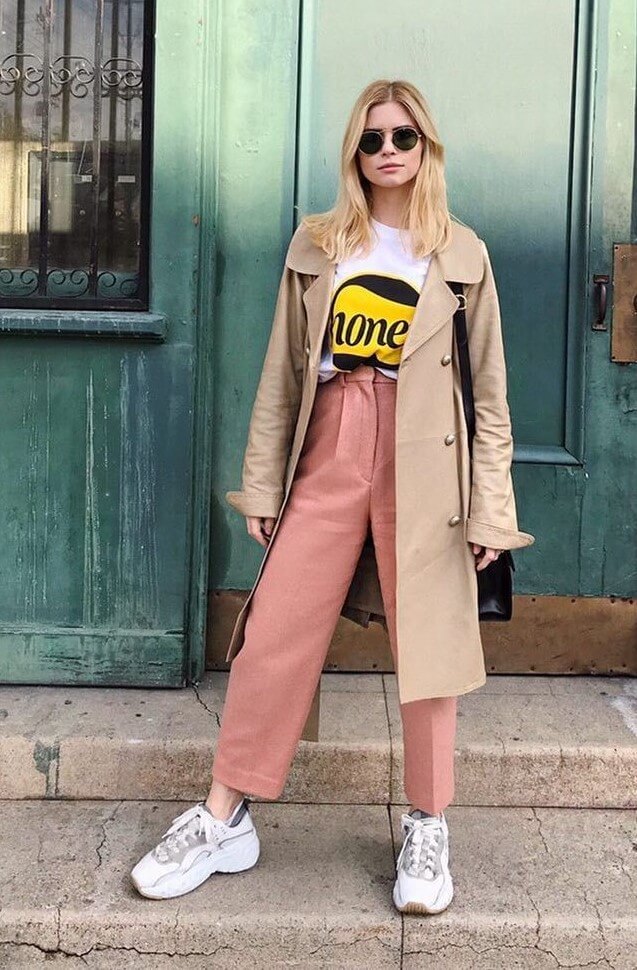 Carlson Young Aces The Casual Look In White Tee With Peach Pants Paired With Beige Trench