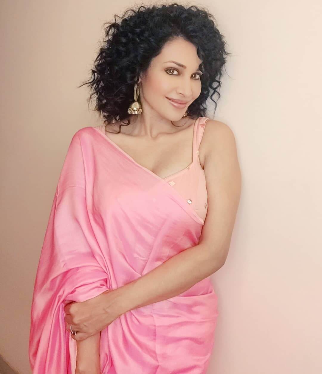 Flora Saini Look Gorgeous In Pink Solid Saree With Sleeveless Blouse