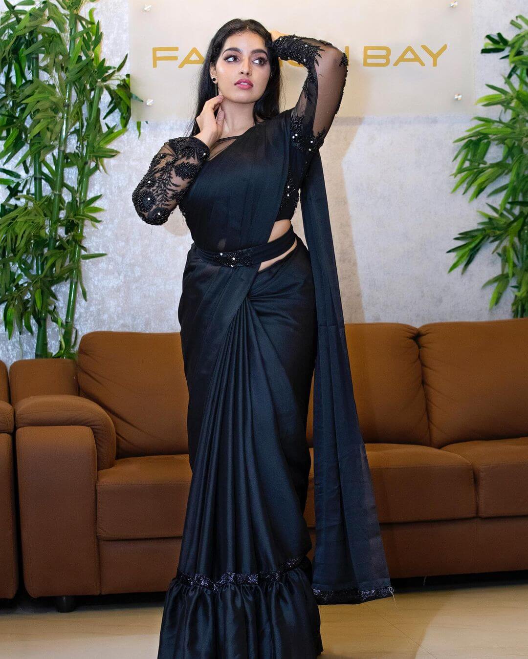 Malavika Menon Slayed Solid Black Saree Paired With Embroidered Full Sleeves Blouse