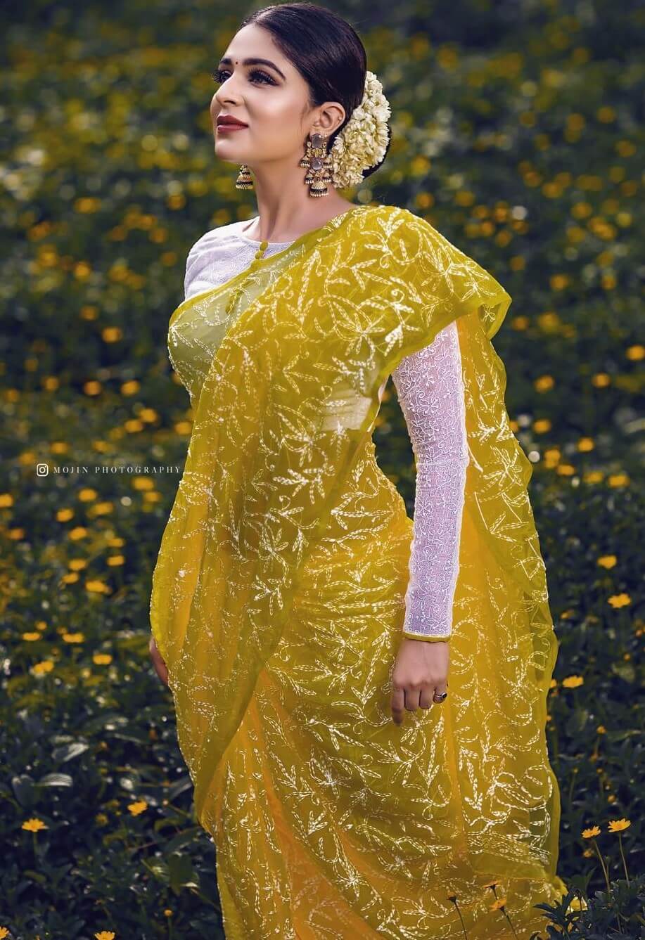 Malavika Wales Dazzles In Perfect Yellow Embellished Saree