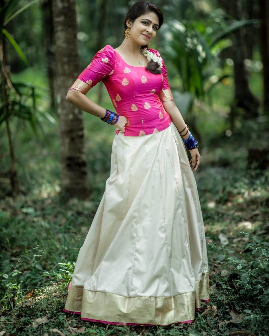 Malavika Wales In Pink Blouse With Off White Lehenga Skirt