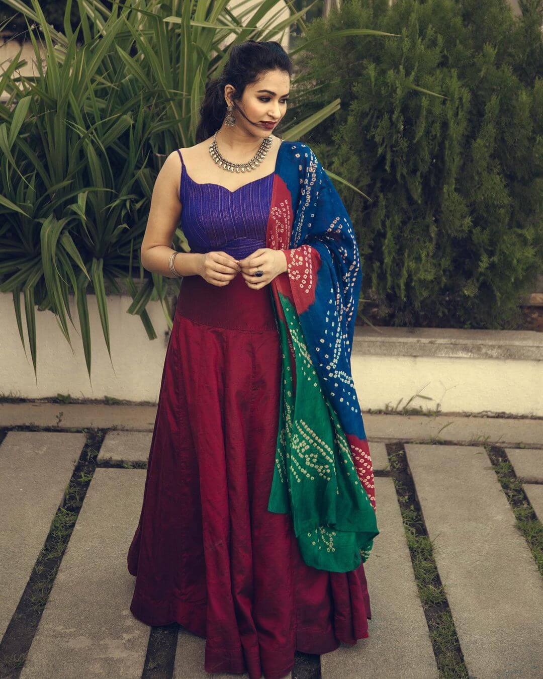 Misha Ghoshal Simple Festive Look In Maroon Skirt With Blue Noddle Strap Blouse Paired With Multi-Colour Bandhani Dupatta