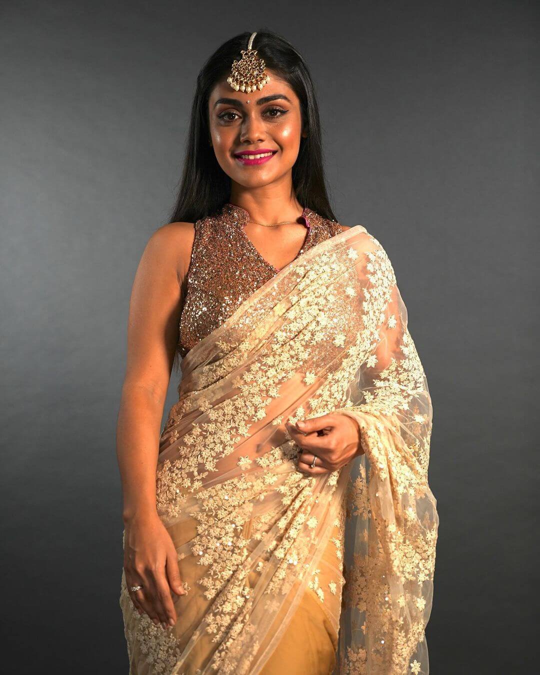 Nazar Fame Sreejita De  Draped In Beige Net Saree With Floral Embroidery Paired With Golden Glittery Blouse