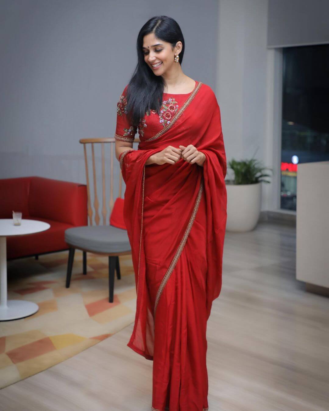 Nyla Usha Look Fabulous In Red Saree With Embroidered Blouse