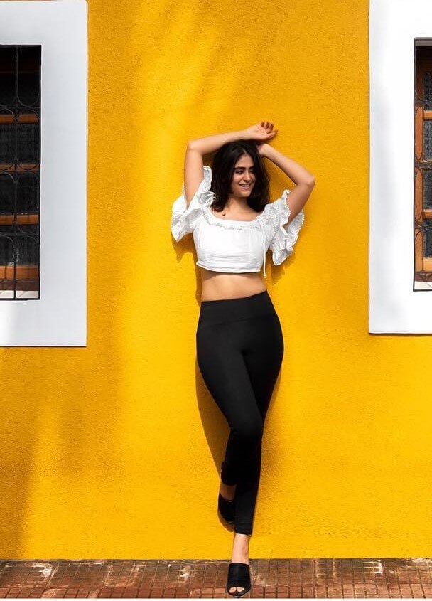 Pallak Lalwani In White Comfy Ruffled Crop Top With Black Tights