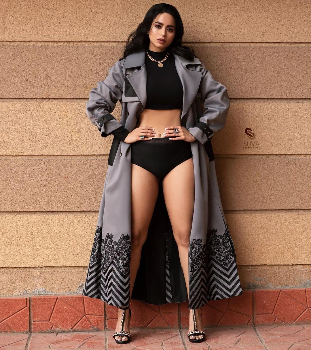 Soundarya Sharma In Black Solid Bikini Paired With Grey Printed Trench Coat