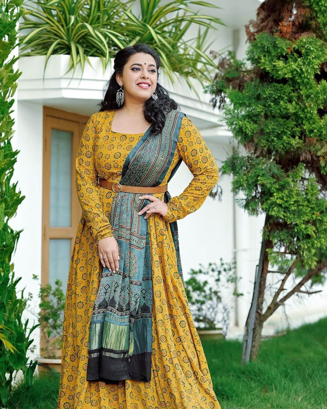 South Actress Jewel Mary In Yellow Printed Cotton Gown Paired With Printed Grey Dupatta