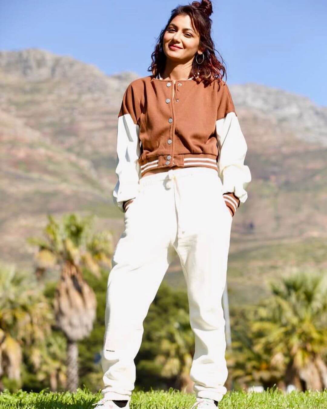 Sriti Jha Enjoying Her Holidays In Mountains Wearing Cool Brown Basketball Jacket With White Joggers