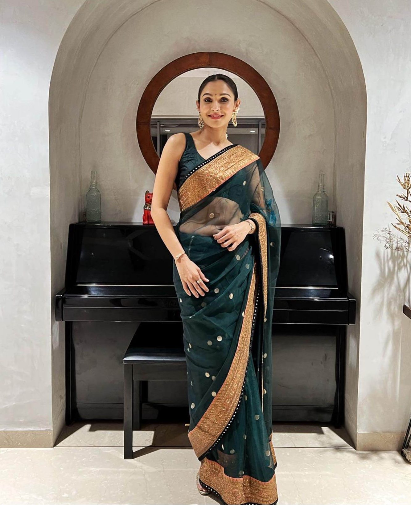 Andrea Jeremiah In Green Golden Border Net Saree With Scoop Strap Blouse