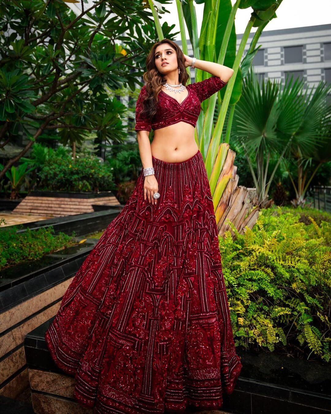 Anupamaa Fame Nidhi Shah Oozes Elegance In Embellished Cherry Red Lehenga