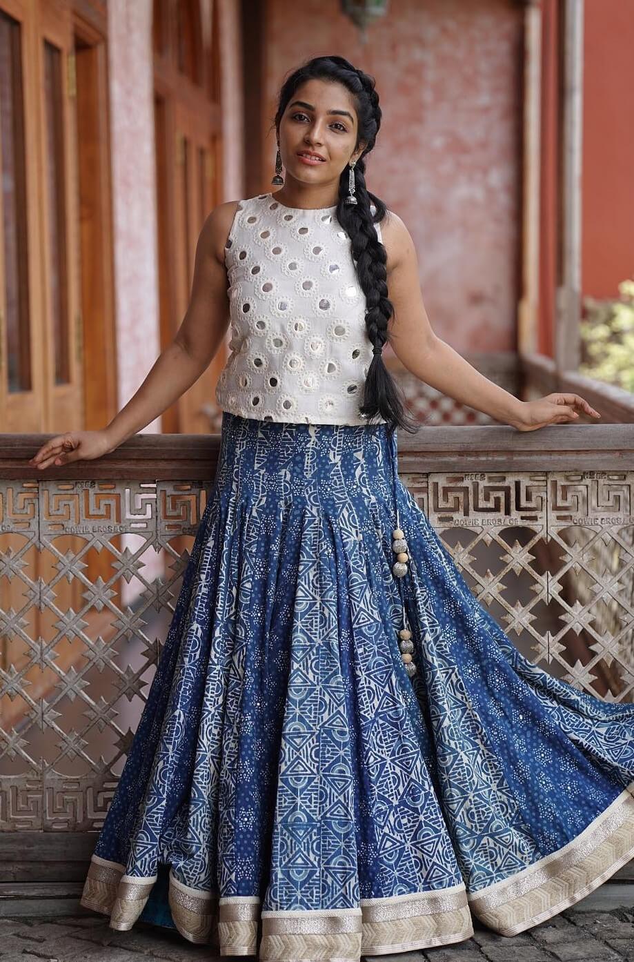Beautiful Rajisha Vijayan In Blue Printed Long Skirt With White Sleeveless Top