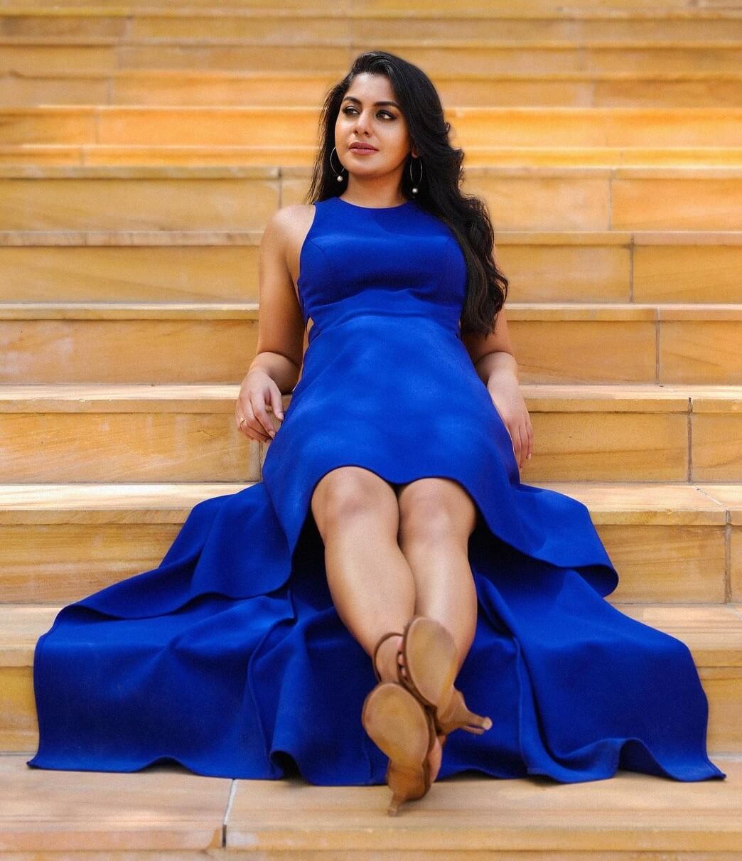 Meera Nandan In Solid Blue Sleeveless Waterfall Dress