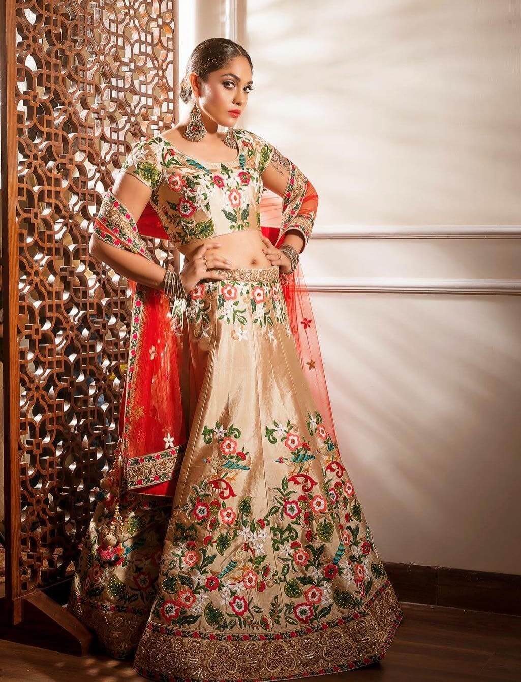 Mumtaz Sorcar In Golden Silk Embroidered Lehenga With Red Dupatta