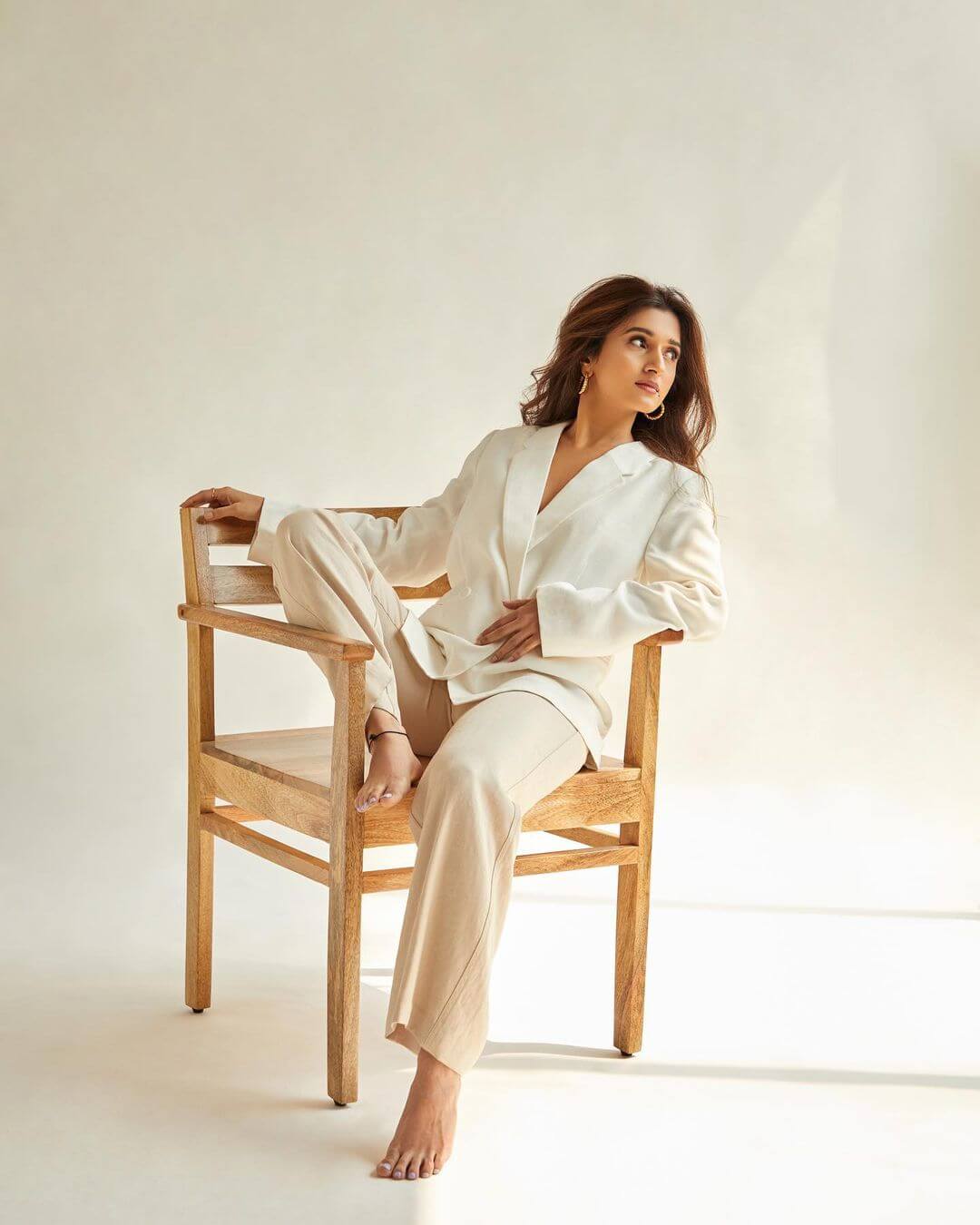 Nidhi Shah Strike A Pose In White Blazer With Beige Pants