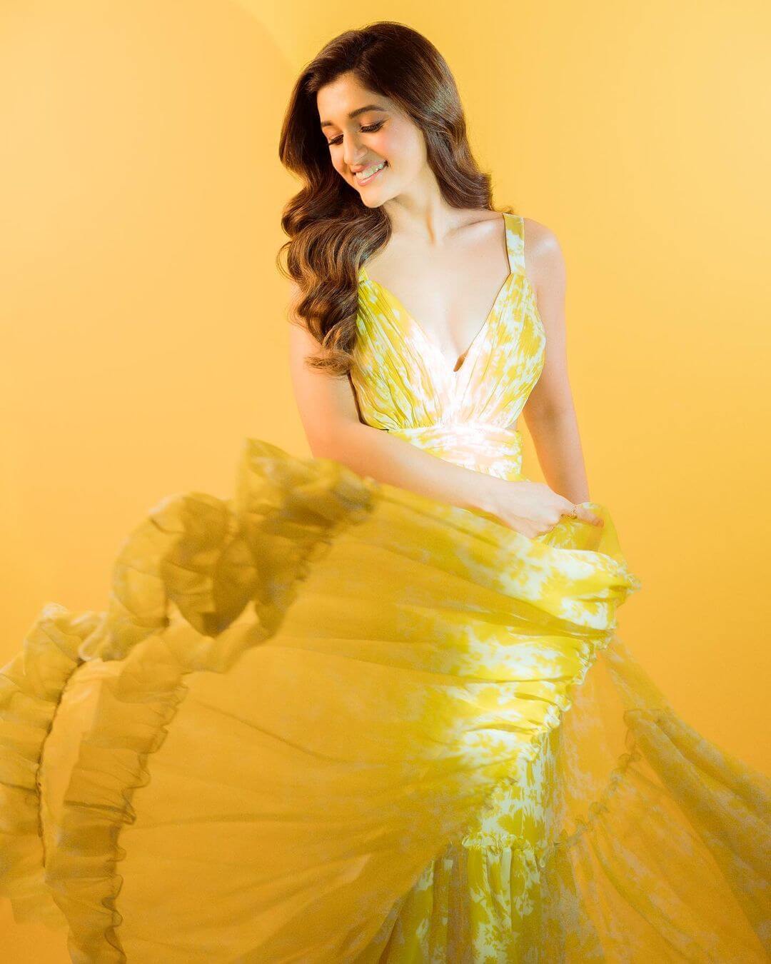 Nidhi Shah Twirls In Yellow Maxi Dress