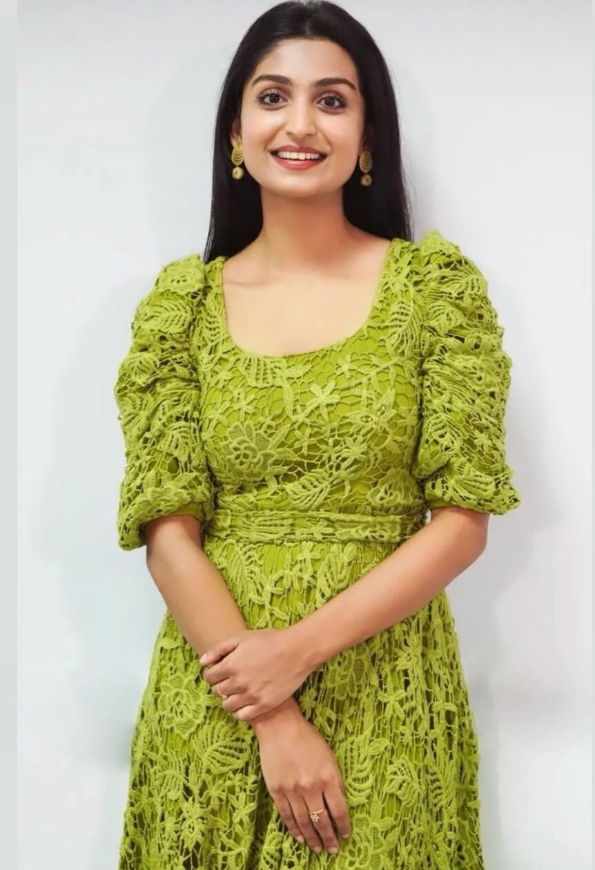Rachel David Decked Up In Green Lace Dress For Kaaval Movie Promotion