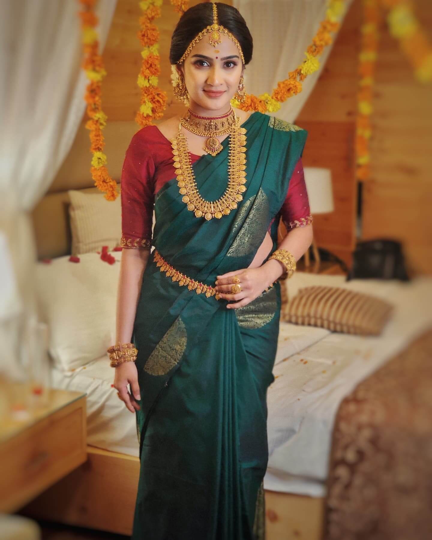 South Bae Aditi Ravi  In Teal Green Saree With Maroon Blouse Paired With Gorgeous Temple Design Bridal Jewellery