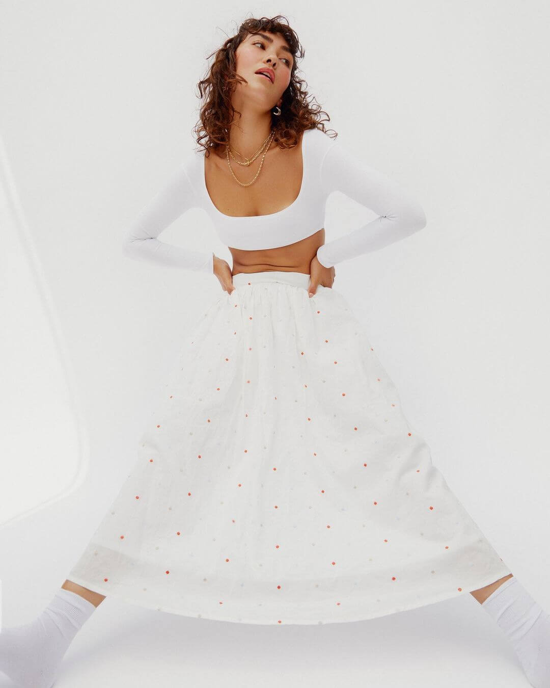 A Celestial Look: Sydney Schafer's Enchanting White Dress with Red Polka Dots
