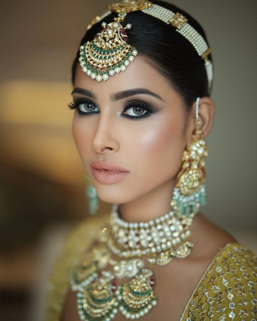 A Statement Smokey Eye Look With Nude Lips To Serve The Ultimate Glamorous Bridal Makeup Look