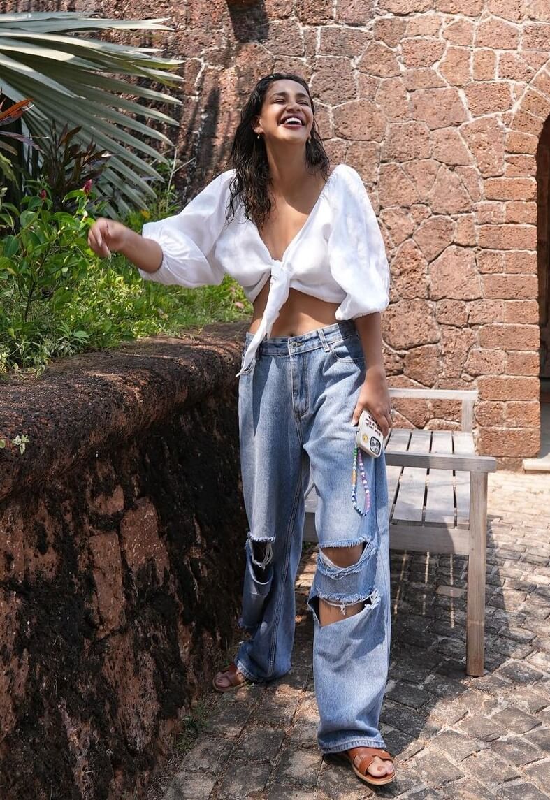 Aisha Sharma's Classic White Top and Blue Jeans Look