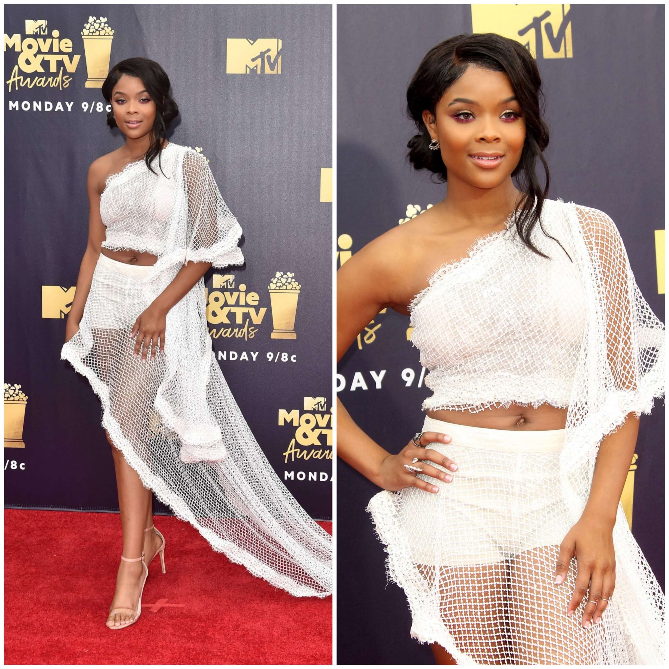 Ajiona Alexus – White Crochet One Side Shoulder Sleeves Long Dress  -  2018 MTV Movie And TV Awards in Santa Monica