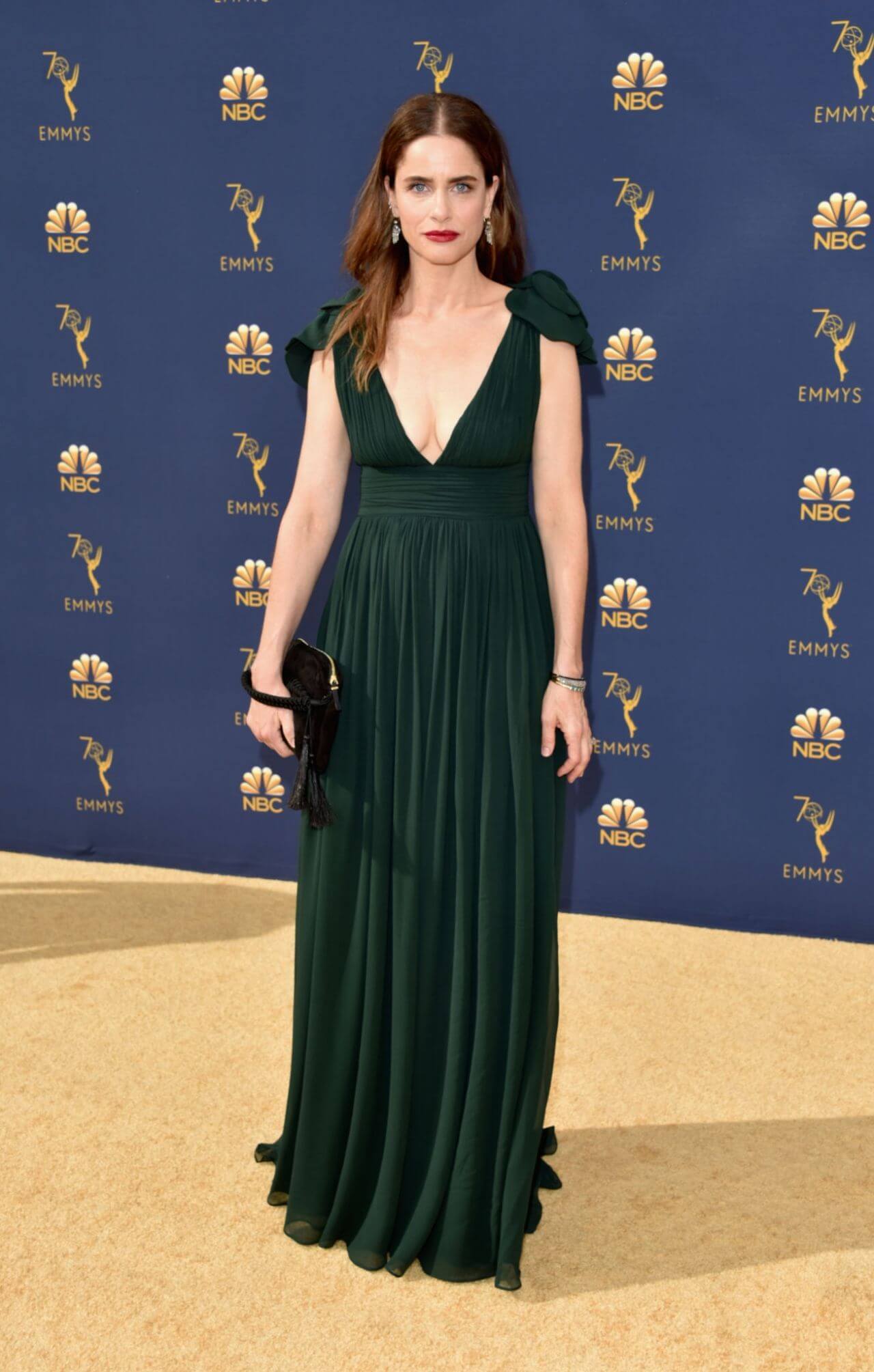Amanda Peet In Green Sheering Deep Neckline Pleated Long Gown At Emmy Awards