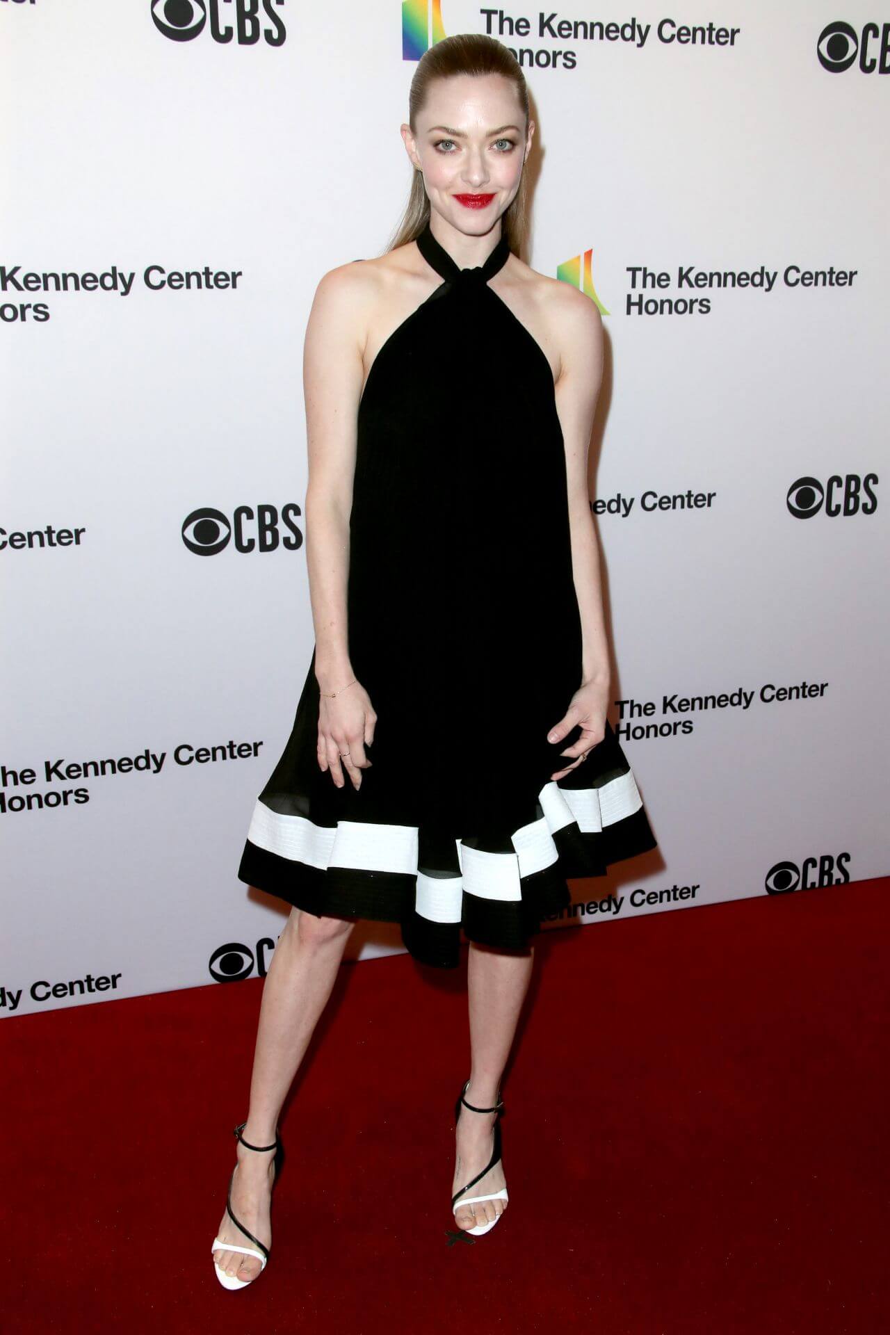 Amanda Seyfried In Black Halter Neck With White Border  Flare Gown At Kennedy Center Honors in Washington DC
