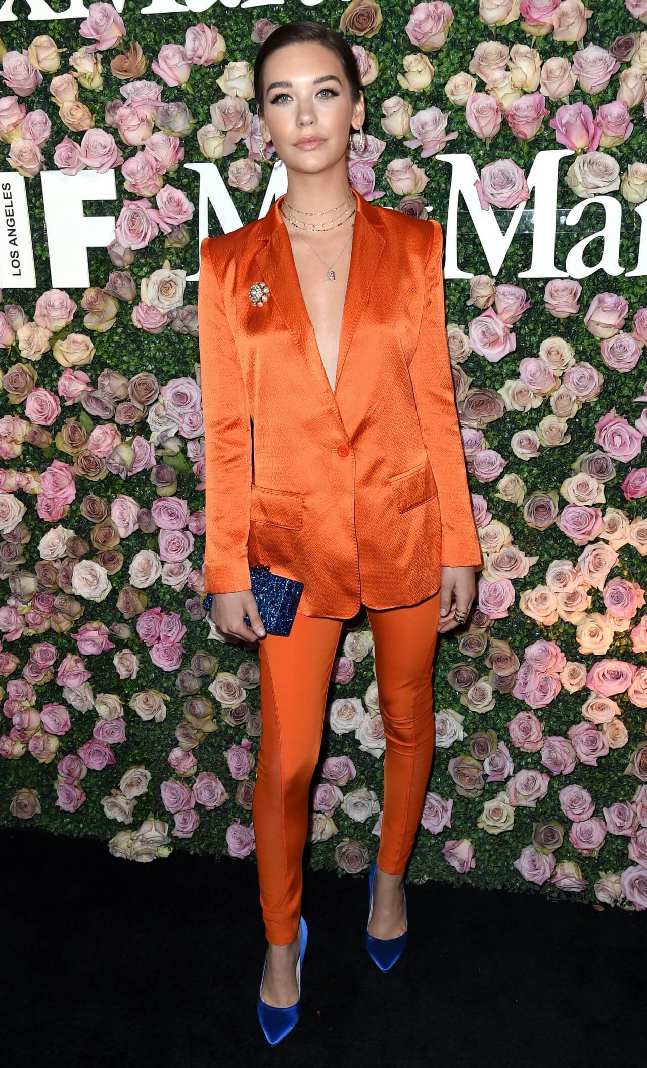 Amanda Steele  In Orange Shiny Pantsuits  With Blue Shiny Pouch Women In Film Max Mara Face of the Future Awards in LA