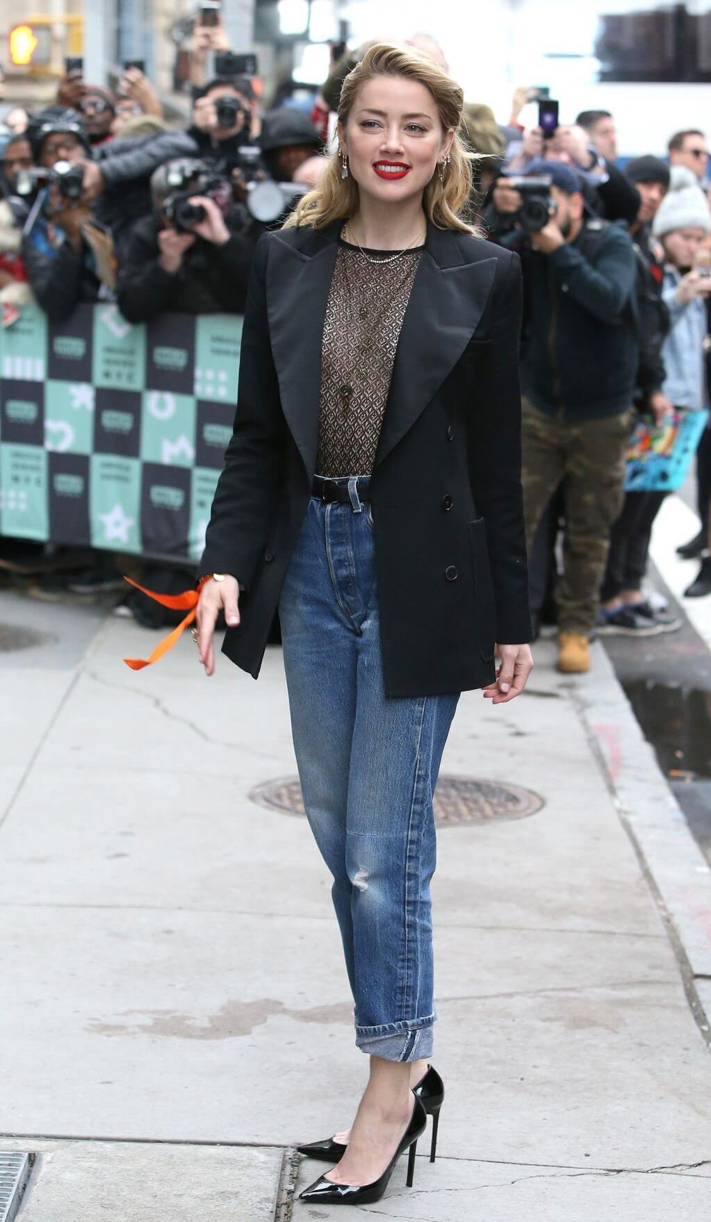 Amber Heard In Black Blazer With Blue Denim Jeans At Outside the BUILD Series Studio in New York