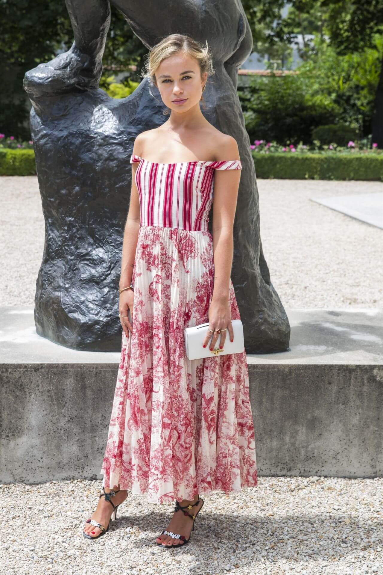 Amelia Windsor In White & Red Vertically Lining Off Shoulder Printed Gown At Christian Dior Show in Paris