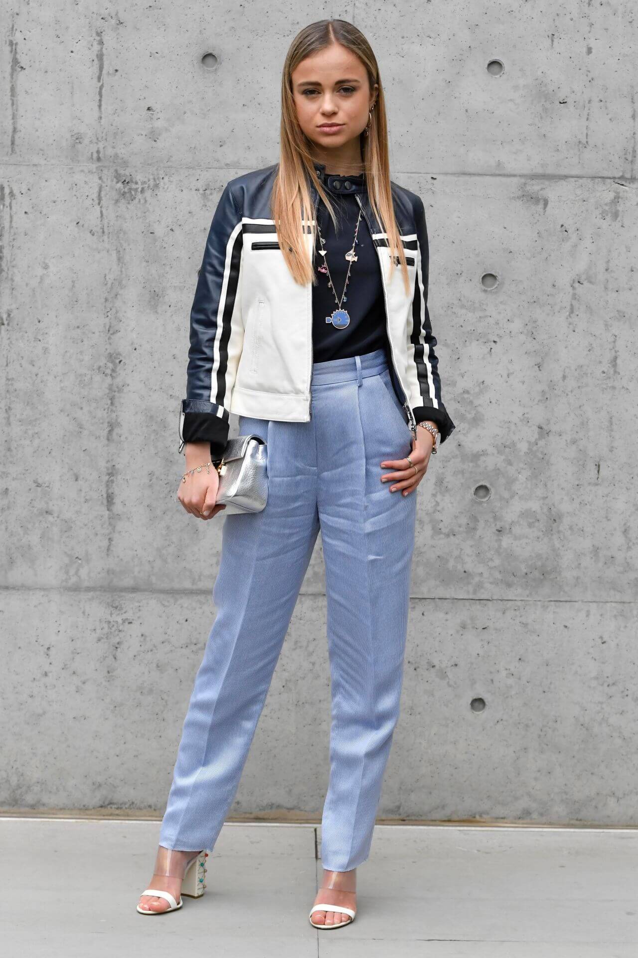 Amelia Windsor in Black Top & Ice Blue Pants With Leather Jacket At Emporio Armani Show FW18 in Milan