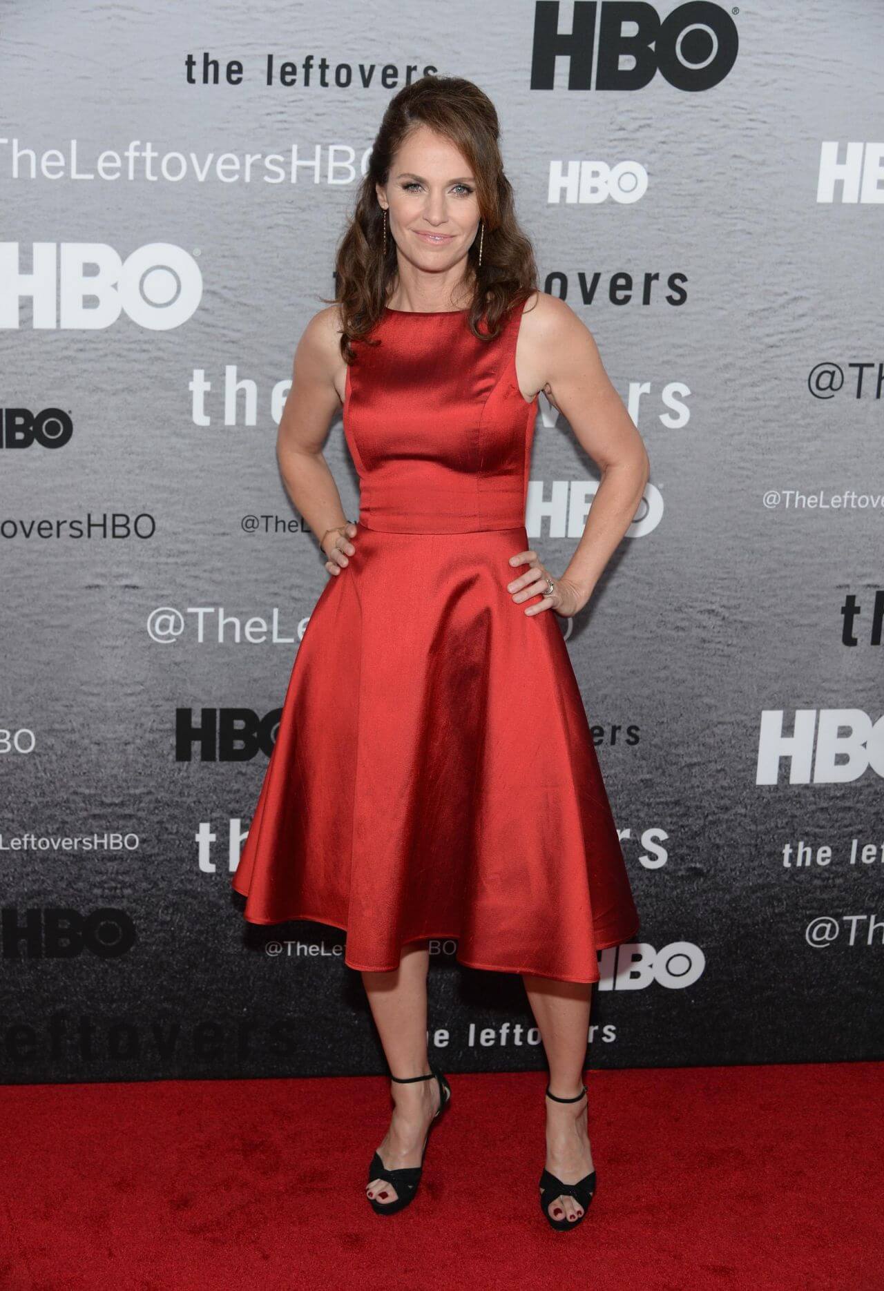 Amy Brenneman  In Red Shiny Satin Sleeveless Fit & Flare Short Dress At ‘The Leftovers’ Premiere in New York City