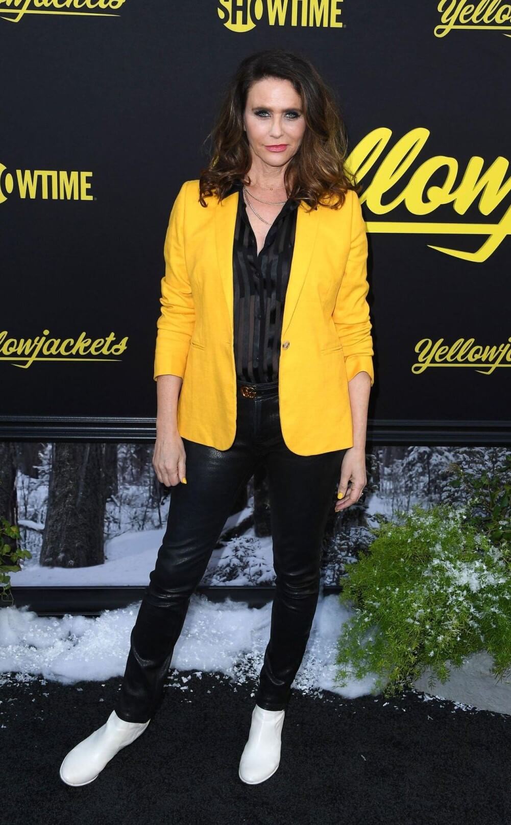 Amy Landecker In Black Shiny Shirt With Leather Pants At “Yellowjackets” Season 2 Premiere in Hollywood