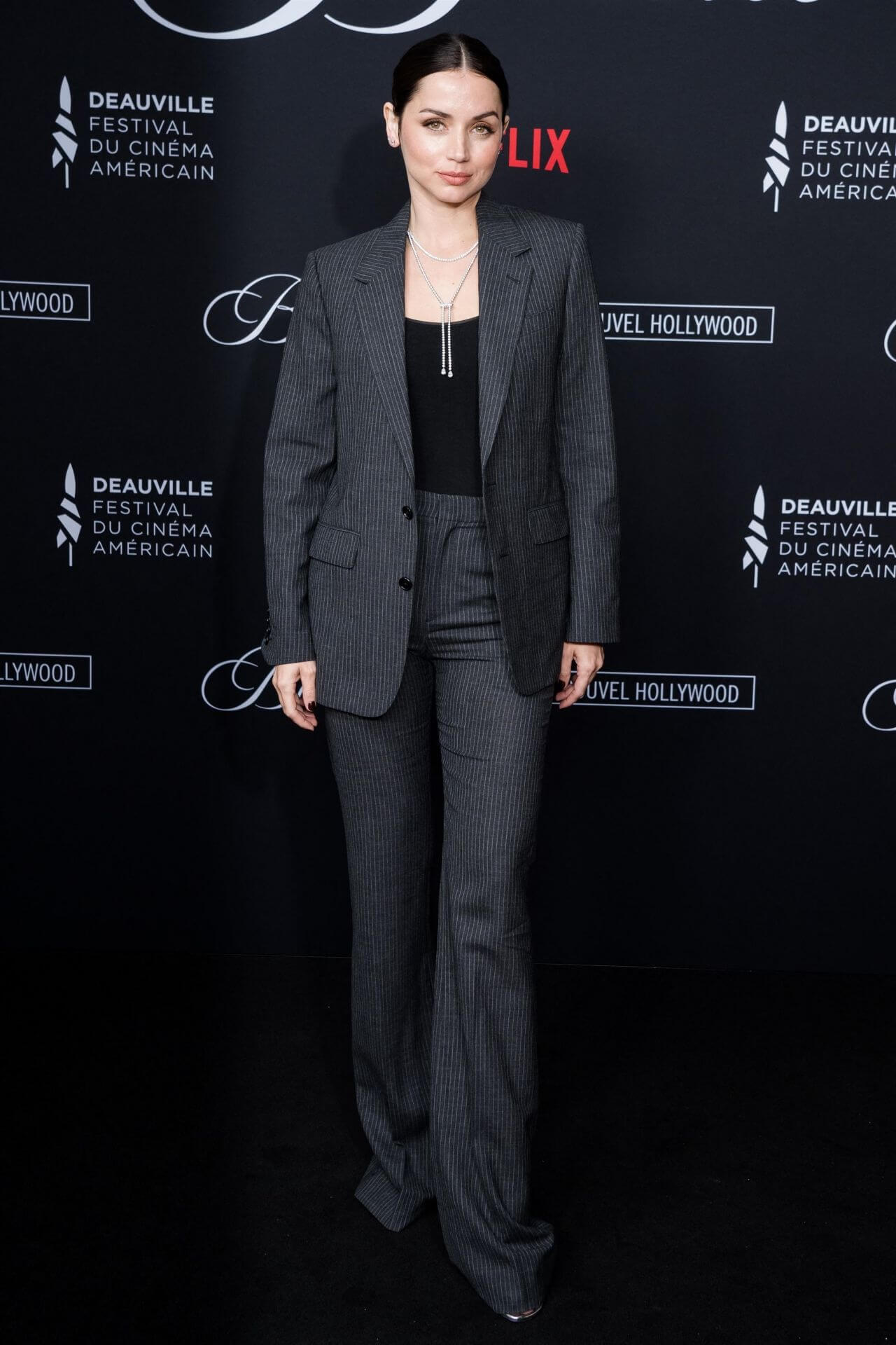 Ana de Armas  In Black Stripped Blazer & Pants With Top At“Blonde” Diner at Deauville American Film Festival