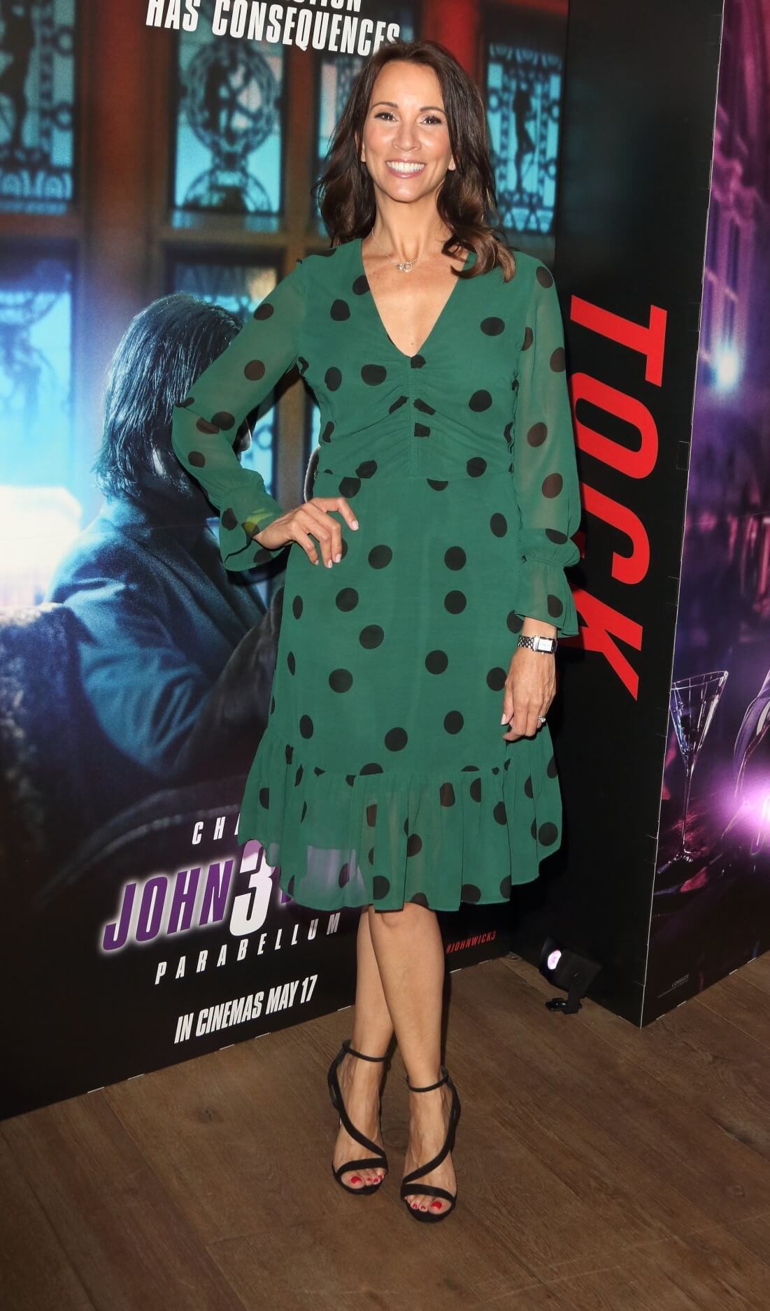 Andrea McLean In Green Polka Dot Ruffle Dress At“John Wick: Chapter 3 Parabellum” Special Screening in London