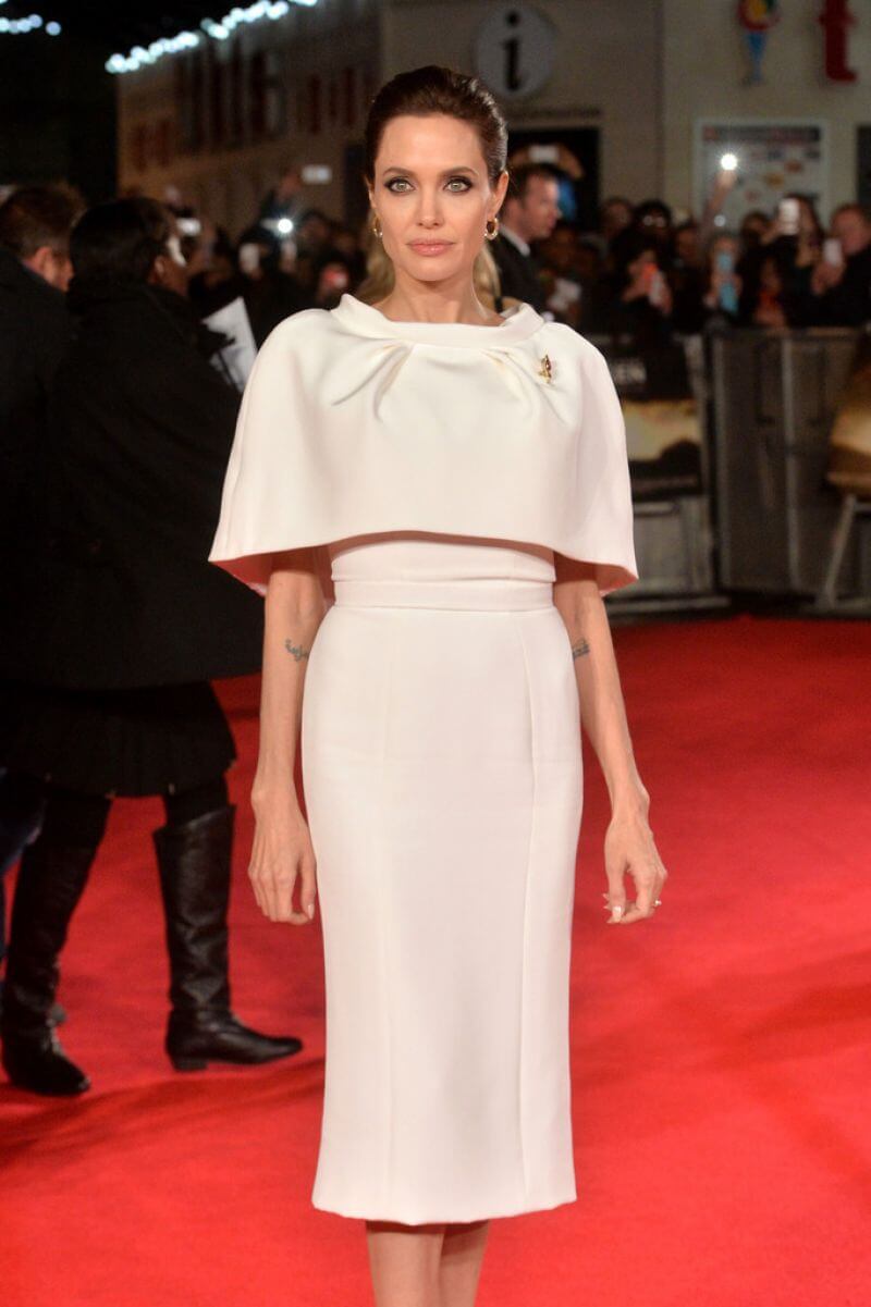 Angelina Jolie In Off White Flare Neck Design Midi Dress At‘Unbroken’ Premiere in London