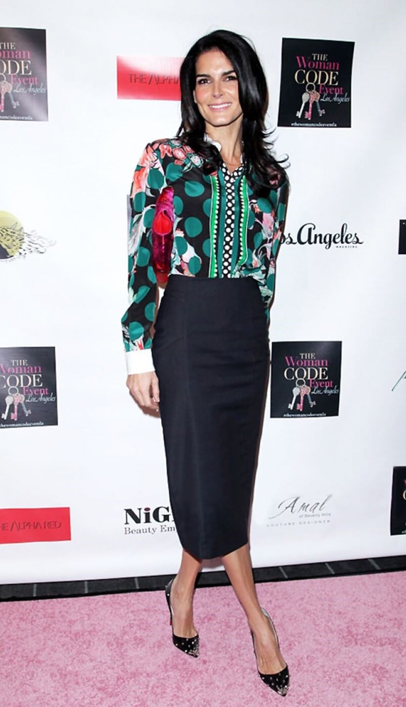 Angie Harmon In Multicolor Top With Black Midi Dress At Evening With the Woman Code Event in Los Angeles