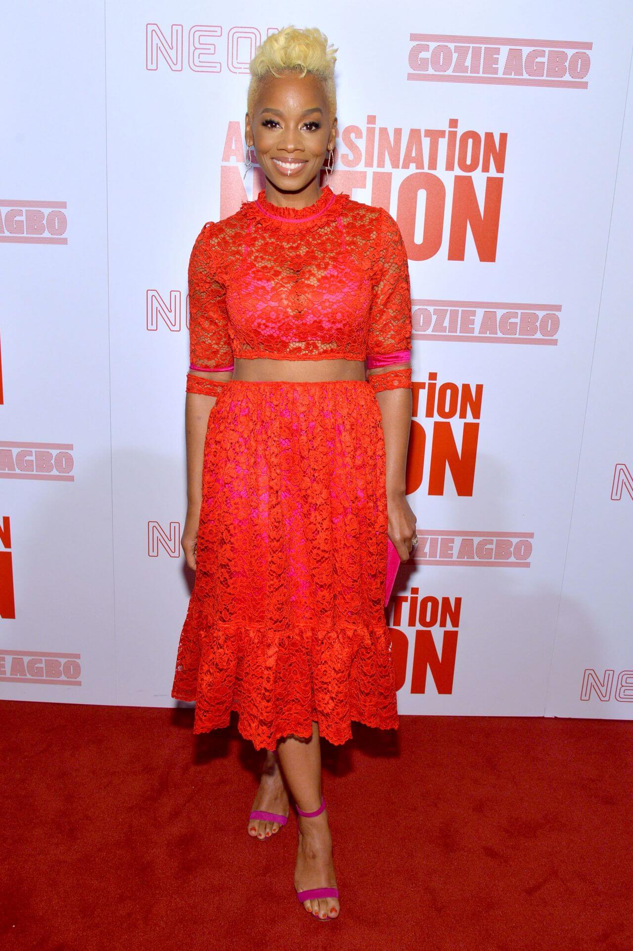 Anika Noni Rose  In Red Lace Design Net  Full Sleeves Crop Top With Ruffle Skirt Outfits At “Assassination Nation” Screening in New York