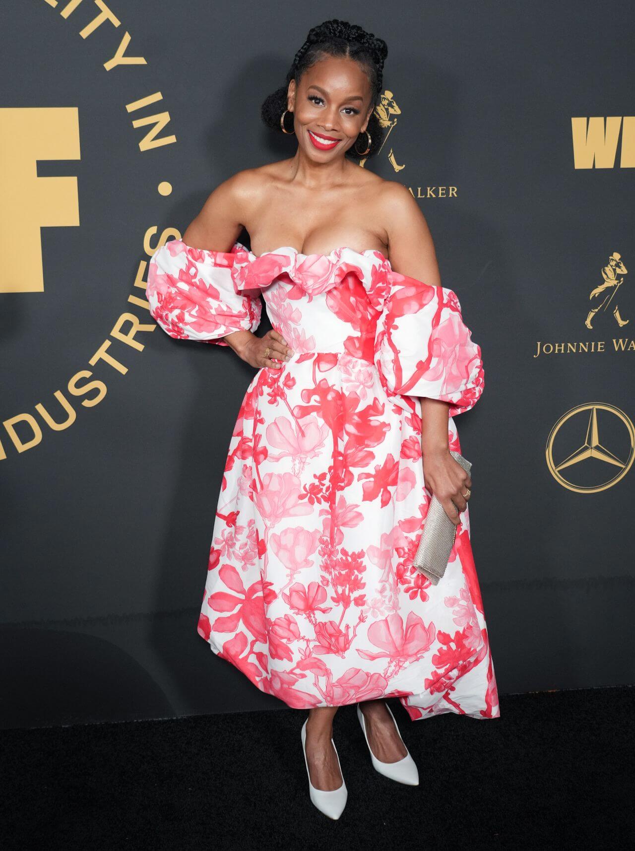 Anika Noni Rose In White Floral Printed With Baggy Sleeves Off Shoulder Gown At Women In Film Oscar Party in LA