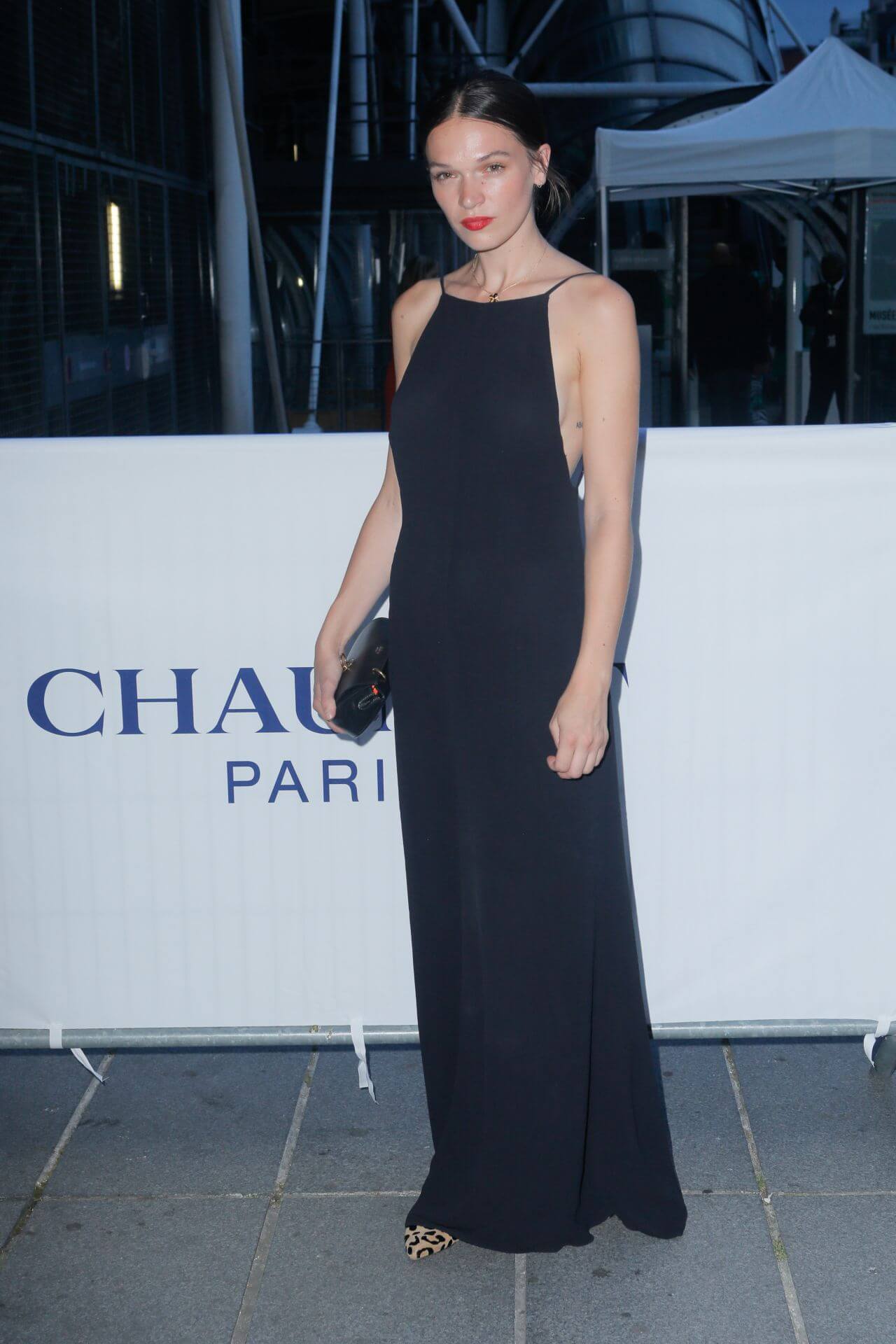 Anna Brewster  In Black Strap Sleeves Long Maxi Dress At Chaumet High Jewelry Party in Paris